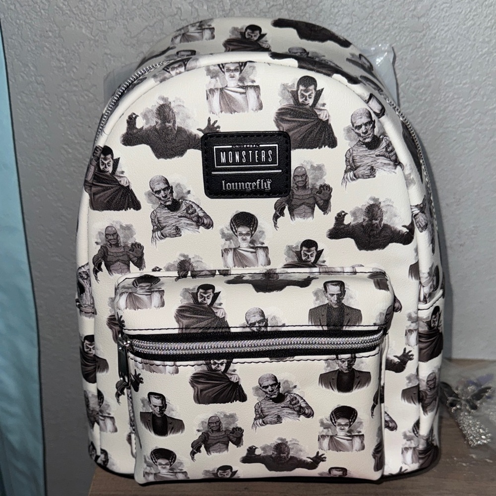 Loungefly Monsters Black & White Mini Backpack with Front Zip Pocket